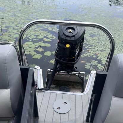Outboard at the dock by Mobile Marine and Motorsports